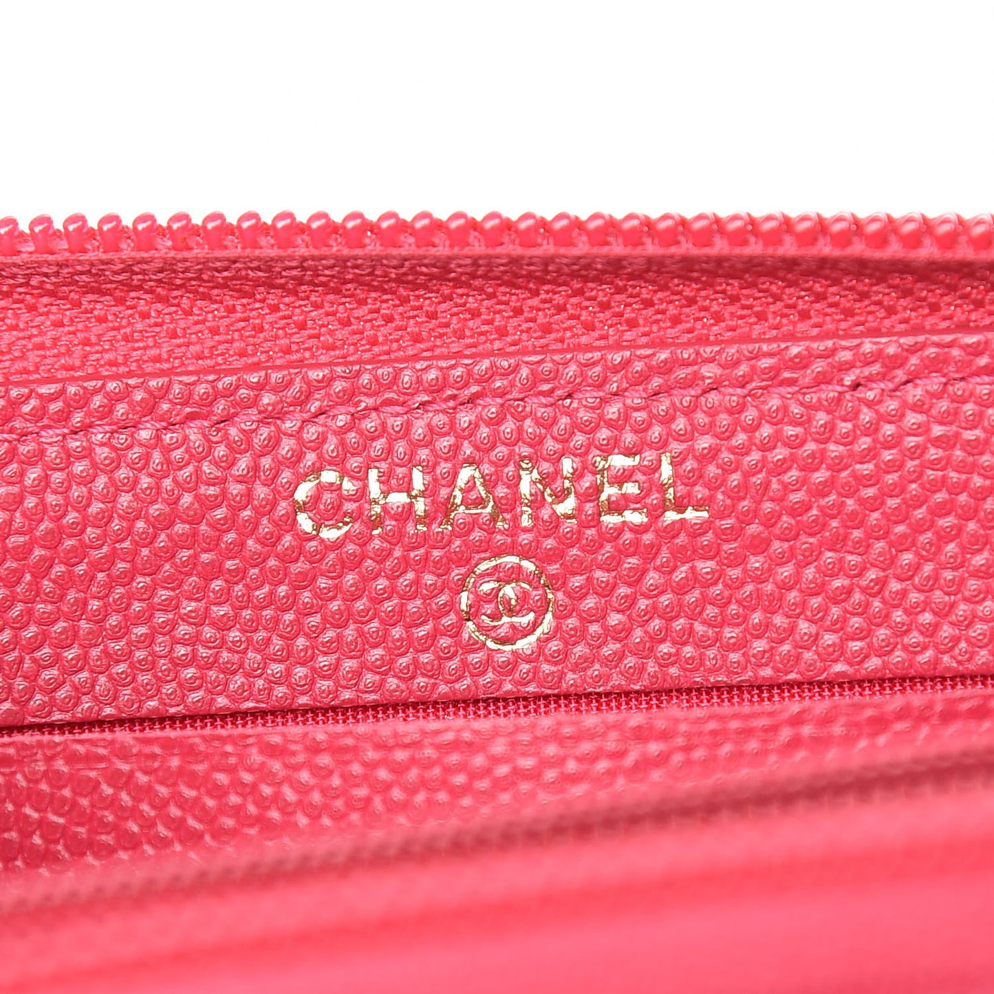 Caviar Quilted Small Boy Zip Around Wallet Fuchsia