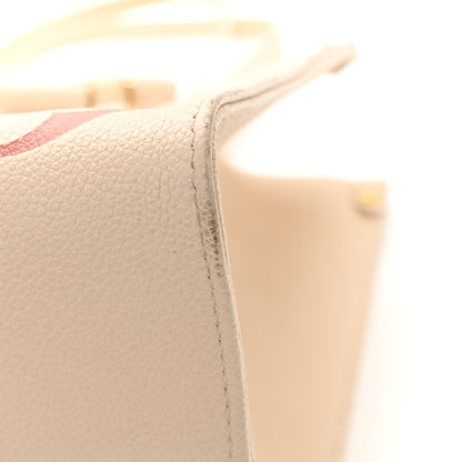 Louis Vuitton Empreinte Monogram Giant Onthego MM Creme Rose Trianon 13 of 14