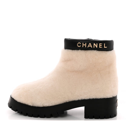 Chanel Shearling Lambskin Logo Ankle Boots 37.5 Ivory Black 1 of 11
