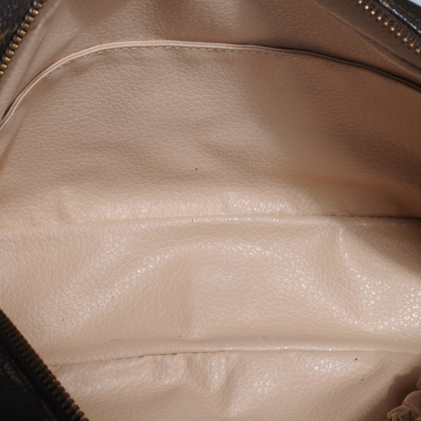 Monogram Trousse Toilette 23