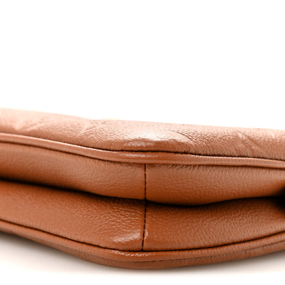 Louis Vuitton Empreinte Monogram Liv Pochette Cognac 10 of 11