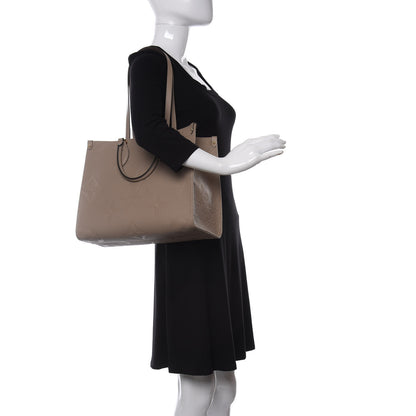 Louis Vuitton Empreinte Monogram Giant Onthego MM Tourterelle 2 of 9