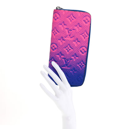 Louis Vuitton Taurillon Illusion Zippy Vertical Wallet Bleu Rose 2 of 11