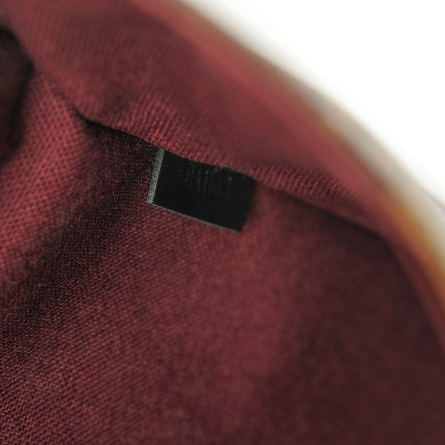 Monogram Macassar District MM