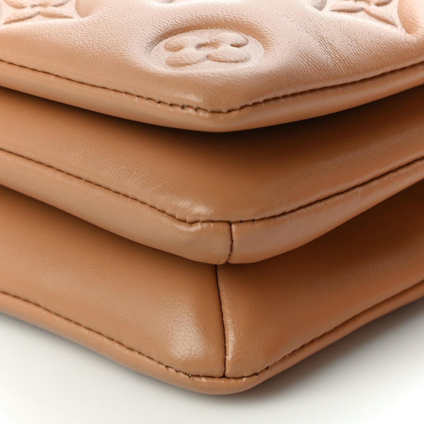 Lambskin Embossed Monogram Pochette Coussin Camel