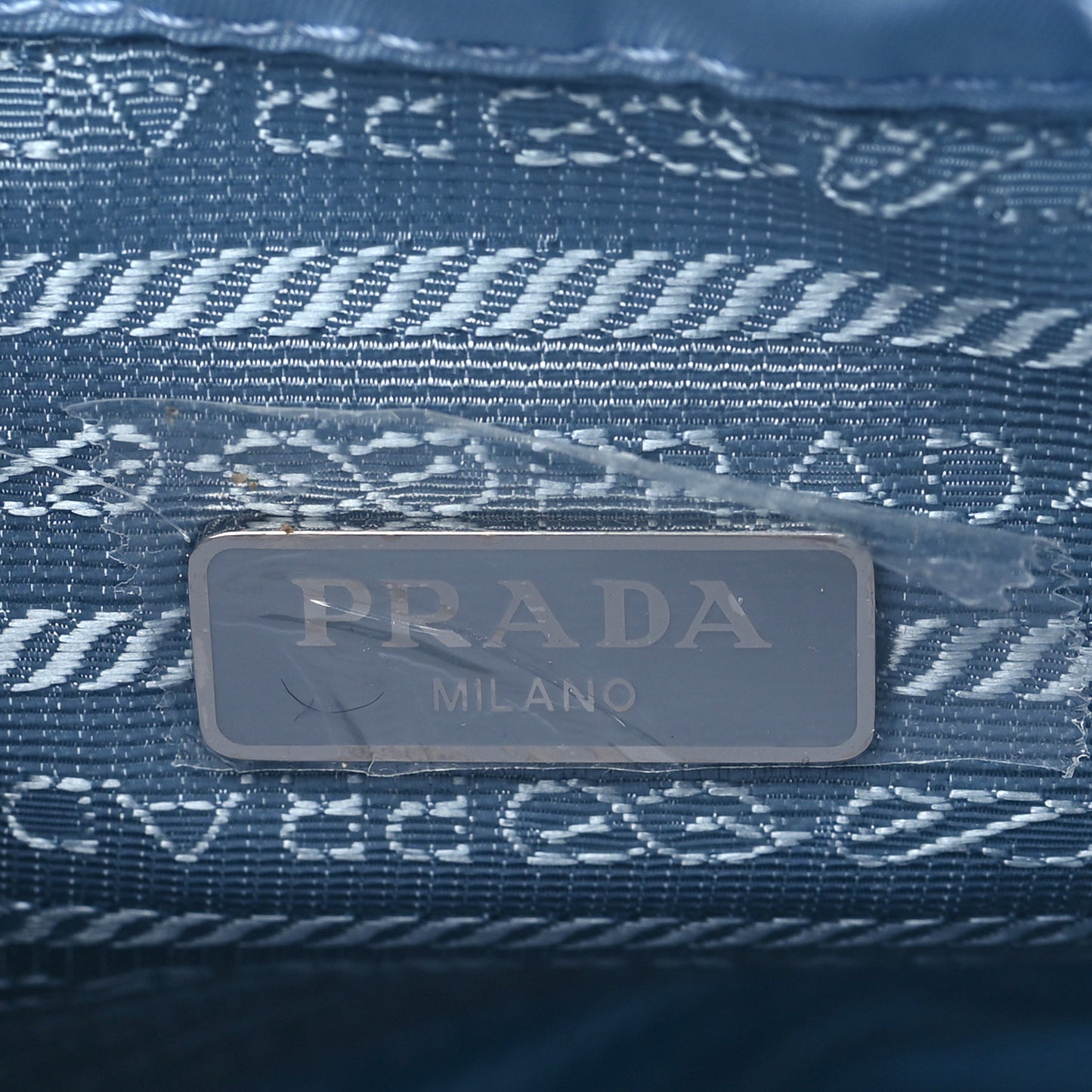 Re-Nylon Saffiano Vela Bucket Wristlet Celeste