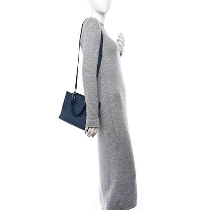 Louis Vuitton Metallic Empreinte Monogram Giant Onthego PM Navy Nacre 2 of 9