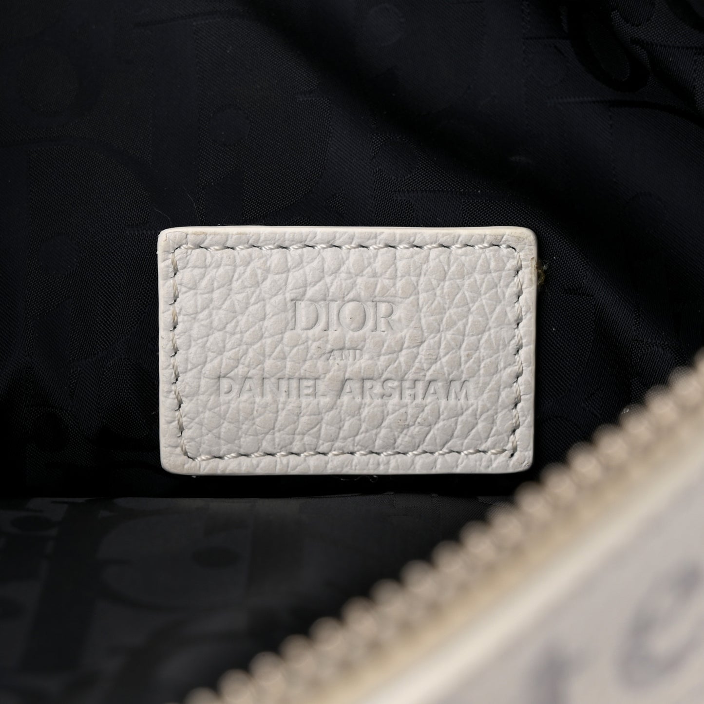 X DANIEL ARSHAM Grained Calfskin Newspaper Print Saddle Bag White