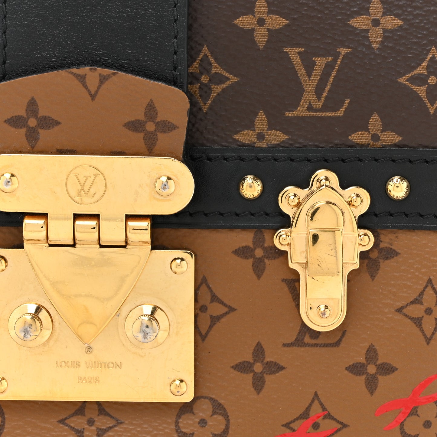 Reverse Monogram Trunk Clutch