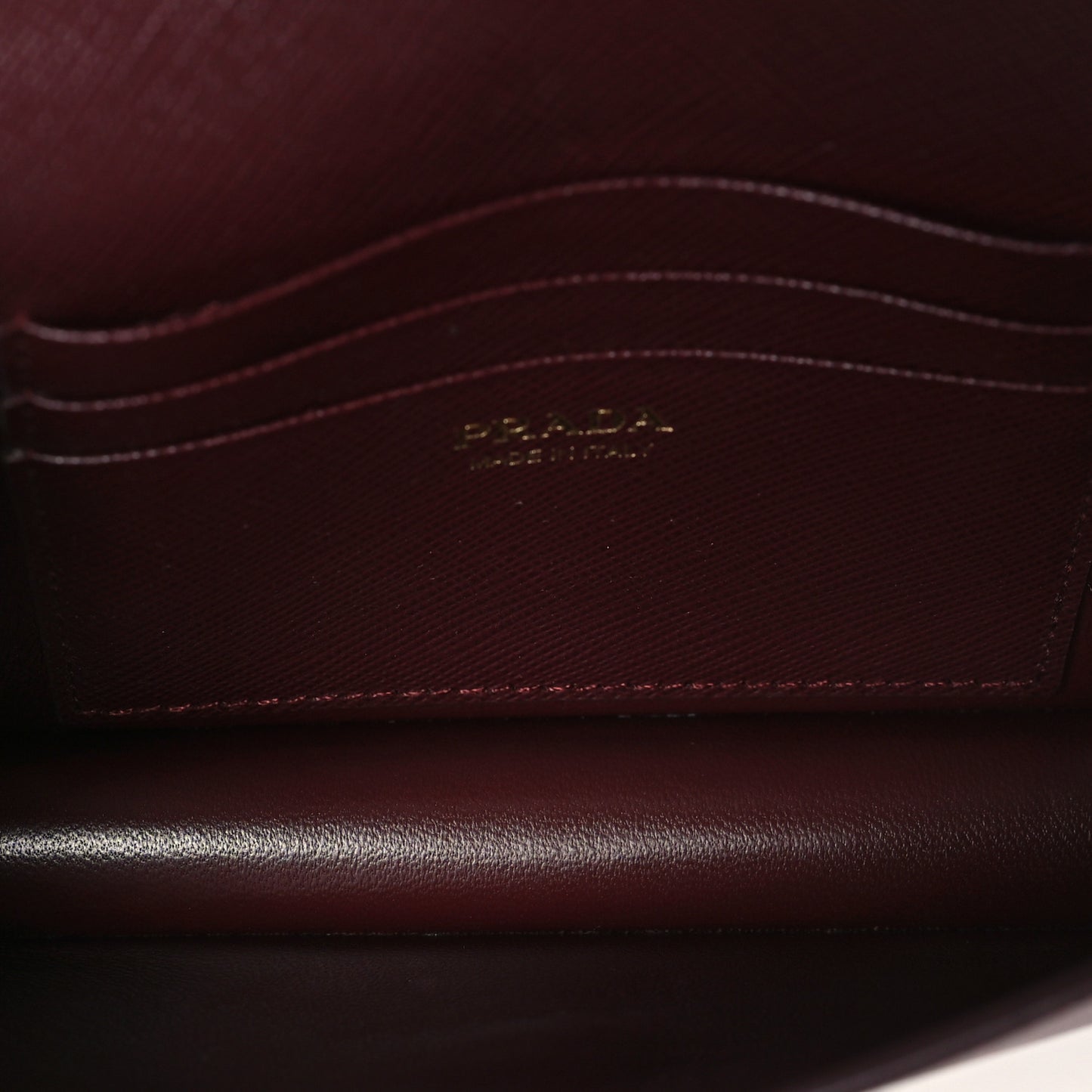 Saffiano Metal Triangle Logo Mini Bag Bordeaux