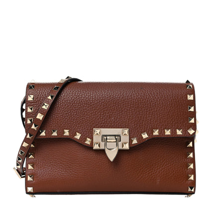 Valentino Garavani Pebbled Calfskin Medium Rockstud Flip Lock Crossbody Bag Saddle Brown 1 of 18