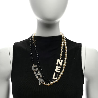 Chanel Metal Enamel Pearl Beaded Cha-Nel Logo CC Long Necklace Black White 3 of 4