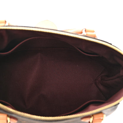 Louis Vuitton Monogram Rivoli MM 6 of 10