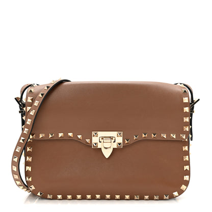Valentino Garavani Vitello Medium Rockstud Flap Saddle Bag Brown 1 of 9