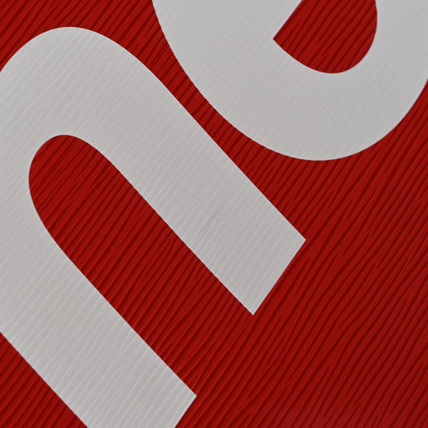 X SUPREME Epi Pochette Jour GM Red