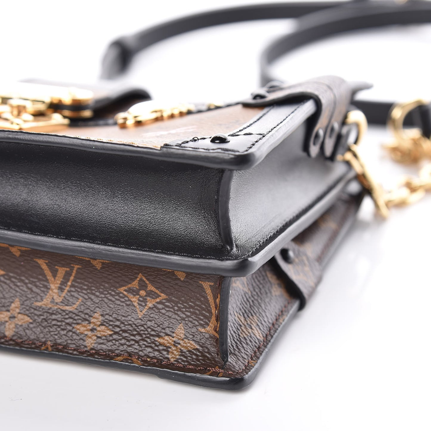 Reverse Monogram Trunk Clutch