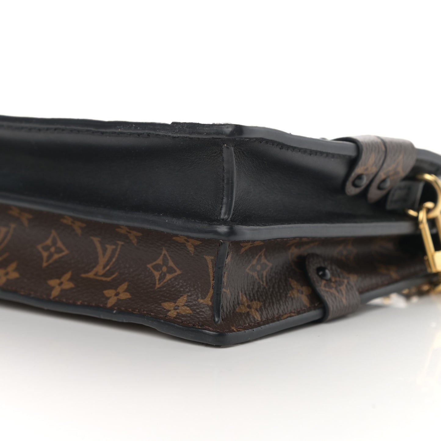 Reverse Monogram Trunk Clutch