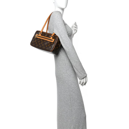Louis Vuitton Monogram Cite MM 2 of 9