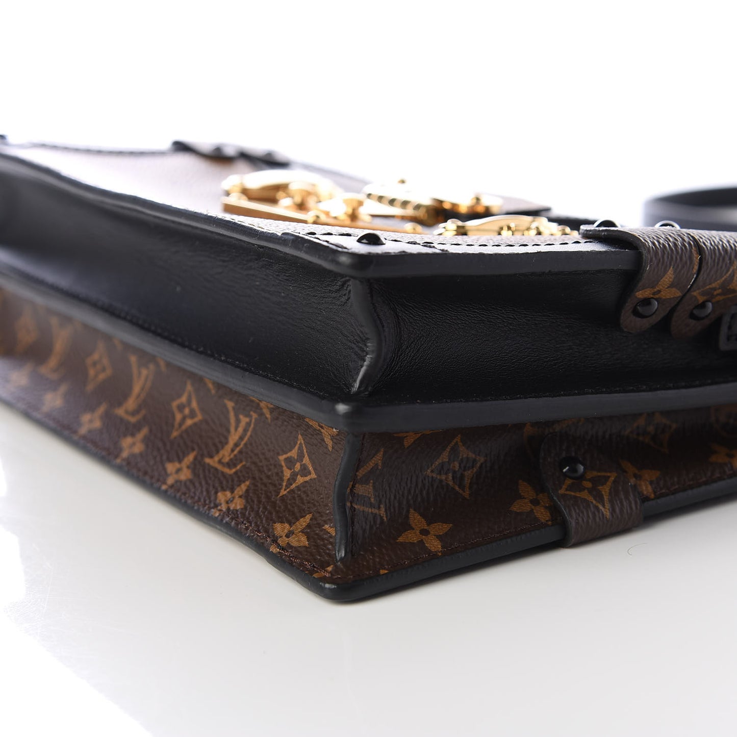 Reverse Monogram Trunk Clutch
