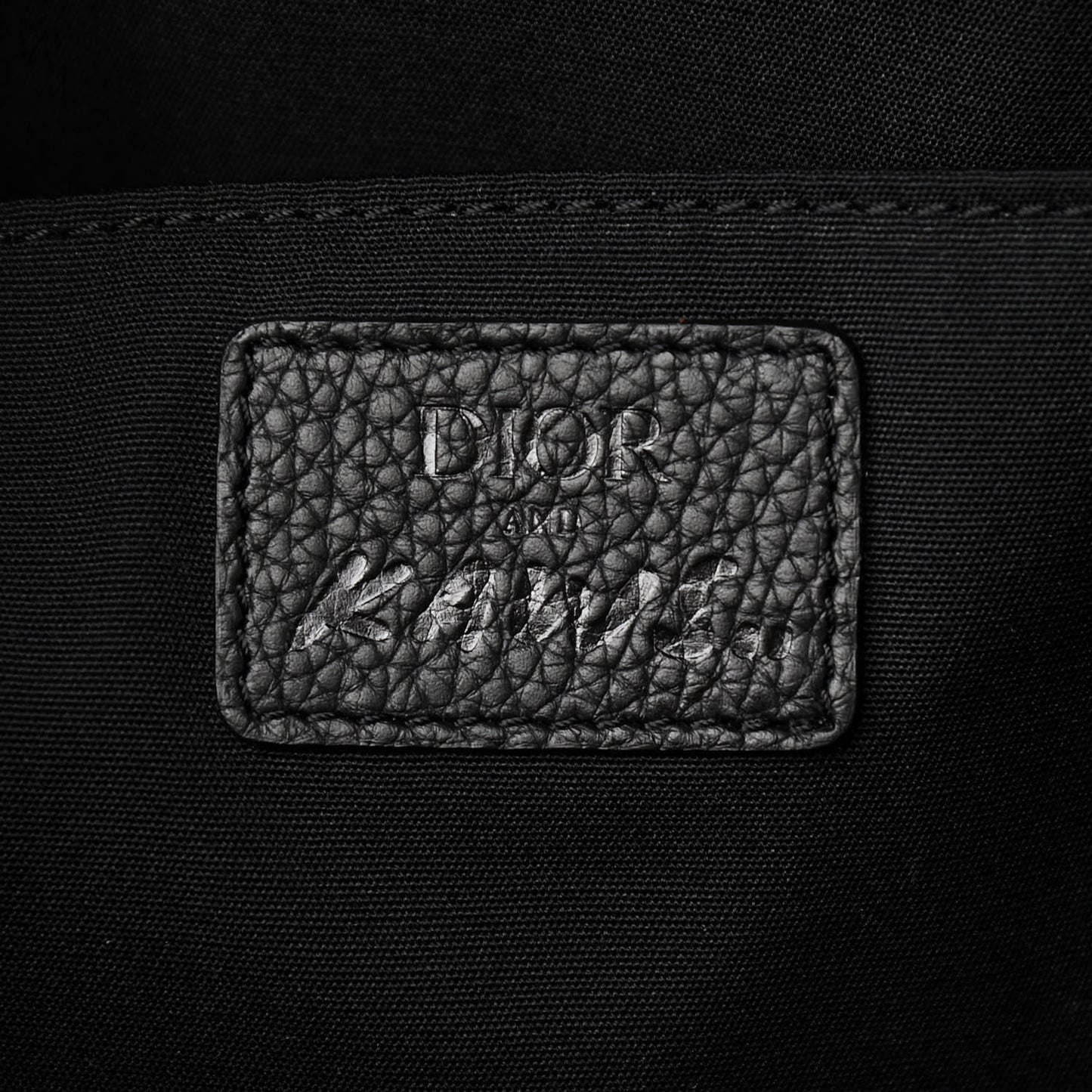 X KAWS Nylon Calfskin Logo Backpack Black