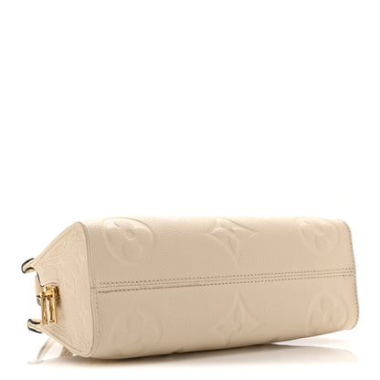 Louis Vuitton Empreinte Monogram Giant OnTheGo East West Creme 4 of 9