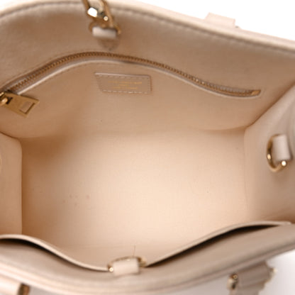 Louis Vuitton Empreinte Monogram Onthego PM Dream Cream 5 of 9