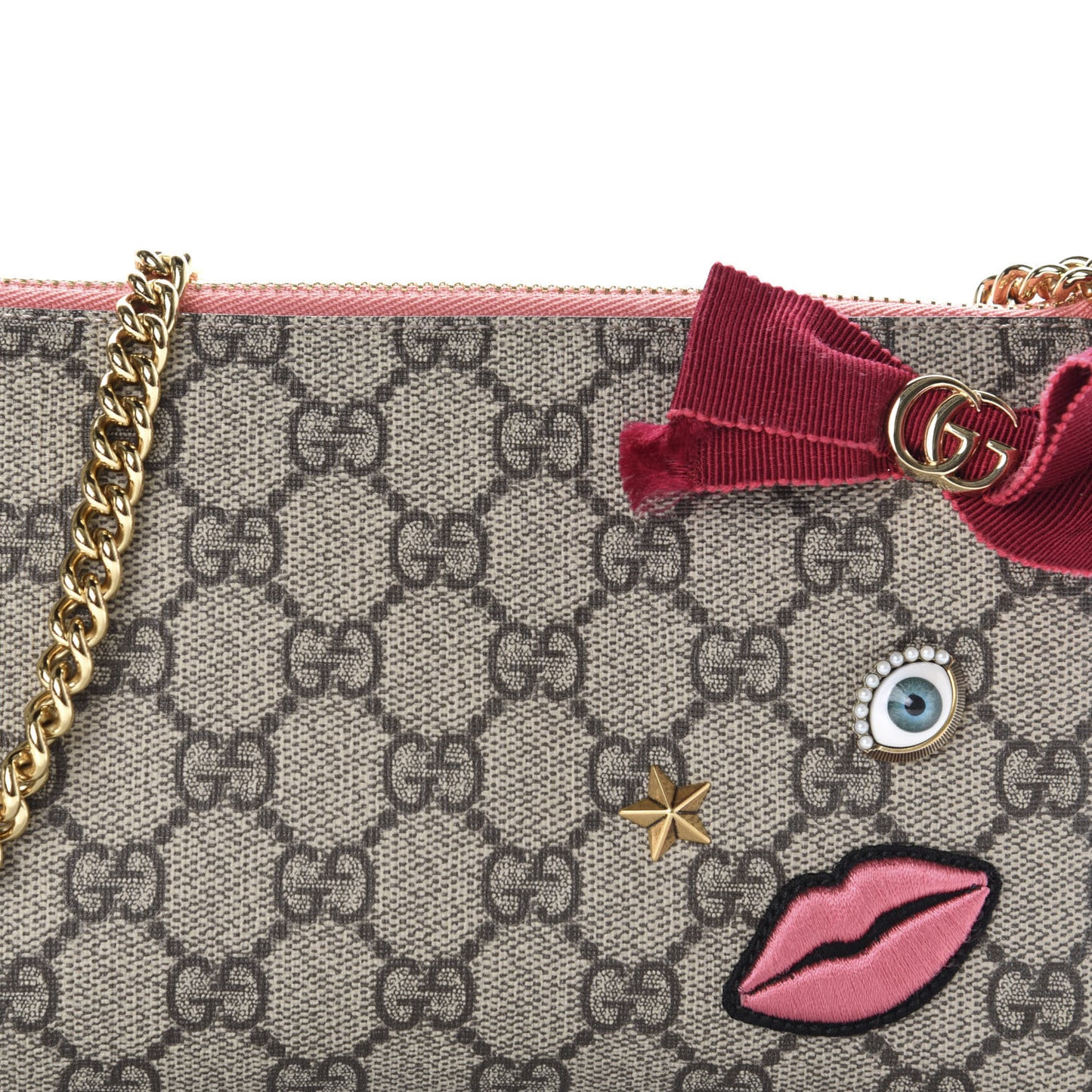 GG Supreme Monogram Face Embroidered Wrist Wallet Pink