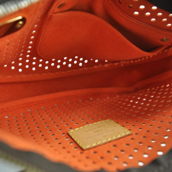 Monogram Perforated Pochette Accessories Bag Orange