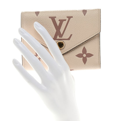 Louis Vuitton Empreinte Monogram Giant Victorine Wallet Creme Bois De Rose 2 of 6