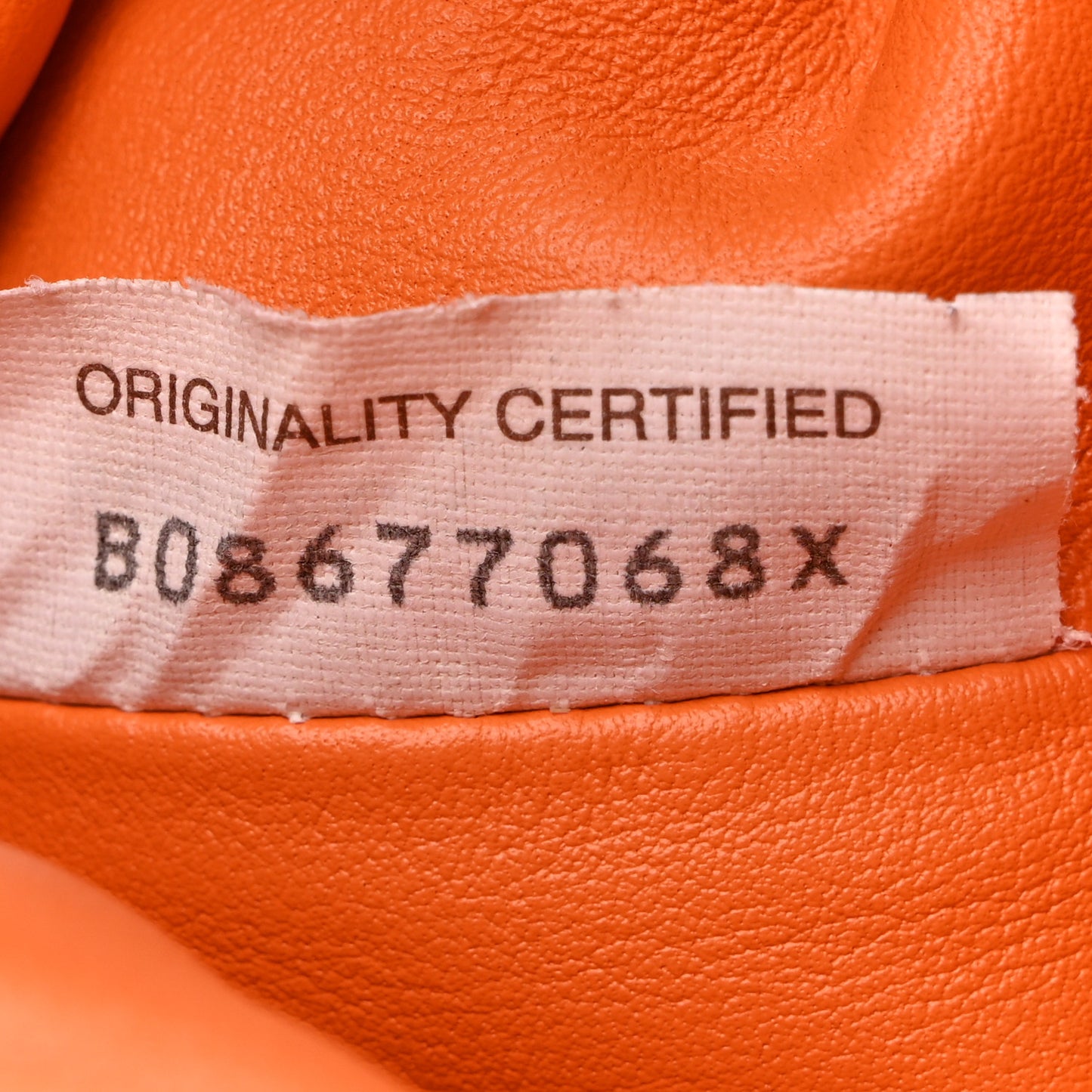 Butter Calfskin The Mini Pouch Light Orange