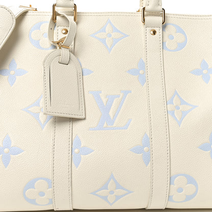 Louis Vuitton Empreinte Monogram Keepall Bandouliere 45 Latte Candy Blue 6 of 9