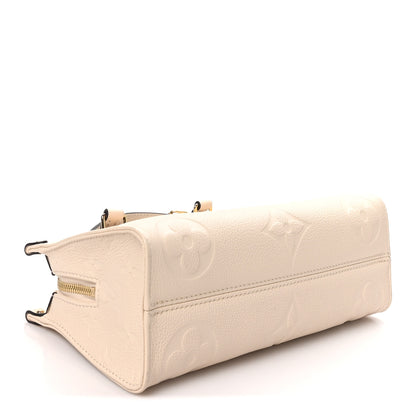 Louis Vuitton Empreinte Monogram Giant OnTheGo East West Creme 4 of 9