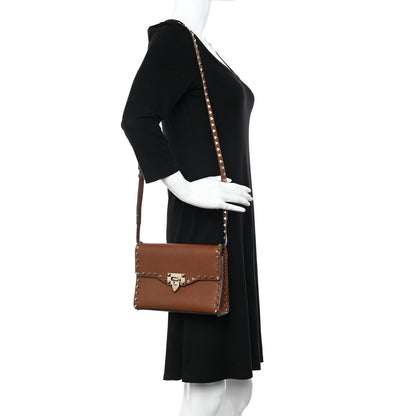 Valentino Garavani Pebbled Calfskin Medium Rockstud Flip Lock Crossbody Bag Bright Cognac 2 of 16