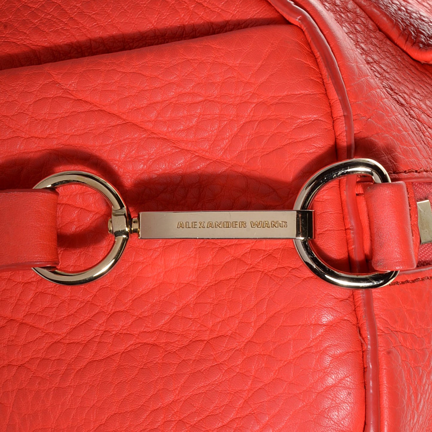 Pebbled Calfskin Rocco Tangerine with Pale Gold Hardware