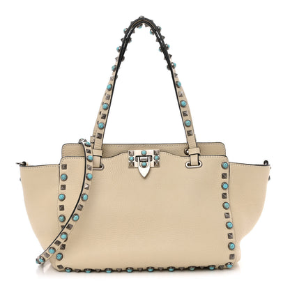 Valentino Garavani Grained Calfskin Turquoise Small Rockstud Rolling Tote Light Ivory 1 of 9