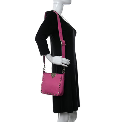 Valentino Garavani Pebbled Calfskin Mini Rockstud Flip-Lock Messenger Bag Pink Orchid 2 of 10