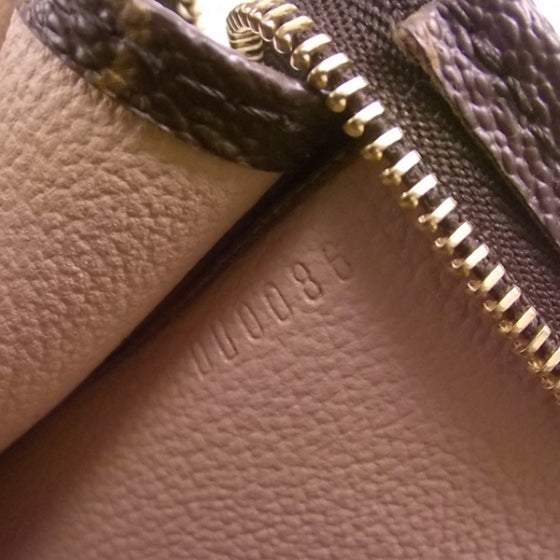 Monogram Poche Toilette 19