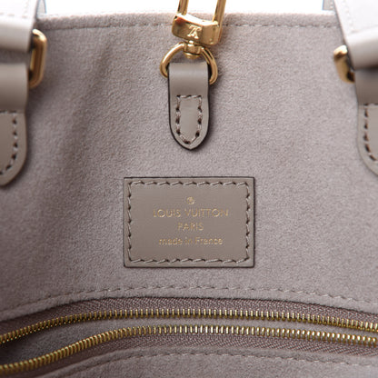 Louis Vuitton Empreinte Monogram Giant Onthego MM Tourterelle Creme 9 of 11