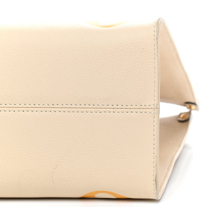 Louis Vuitton Empreinte Monogram Giant By The Pool Onthego MM Cream Saffron 7 of 11