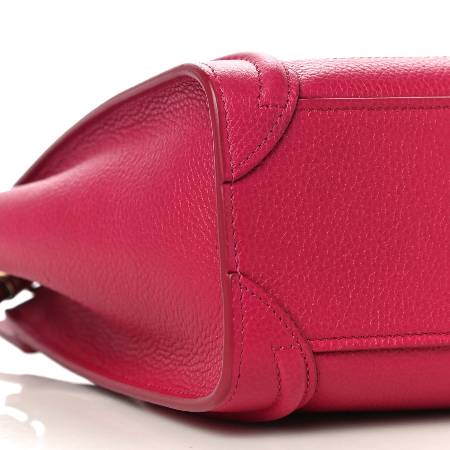 Drummed Calfskin Nano Luggage Fuchsia