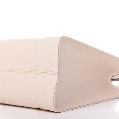 Louis Vuitton Empreinte Monogram Giant By The Pool Onthego MM Cream Saffron 7 of 10