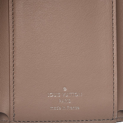 Louis Vuitton Taurillon Capucines Compact Wallet Magnolia 6 of 8