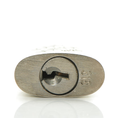Louis Vuitton Brushed Titanium Lock and Key Set 2 of 4