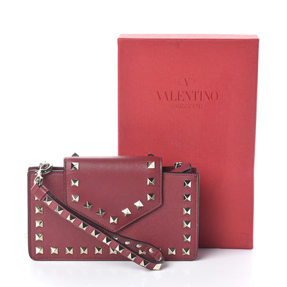 Valentino Garavani Calfskin Rockstud Phone Case With Chain Rubino 7 of 7