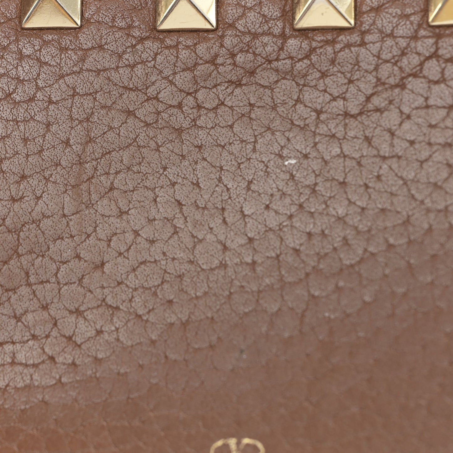 Pebbled Calfskin Rockstud Compact Zip Around Wallet Bright Cognac