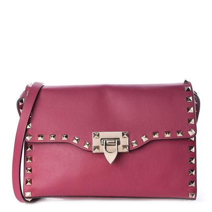 Valentino Garavani Vitello Medium Rockstud Flip Lock Crossbody Bag Fuchsia 1 of 10