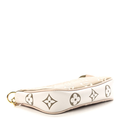Louis Vuitton Empreinte Spring in the City Mini Pochette Accessories Kaki Beige Cream 4 of 7