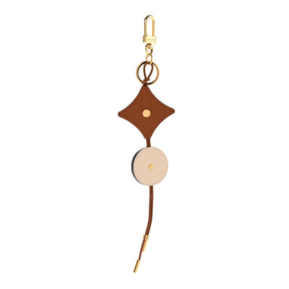 Louis Vuitton Taurillon Portocre Flower Tassel Bag Charm Key Holder Brown 2 of 4
