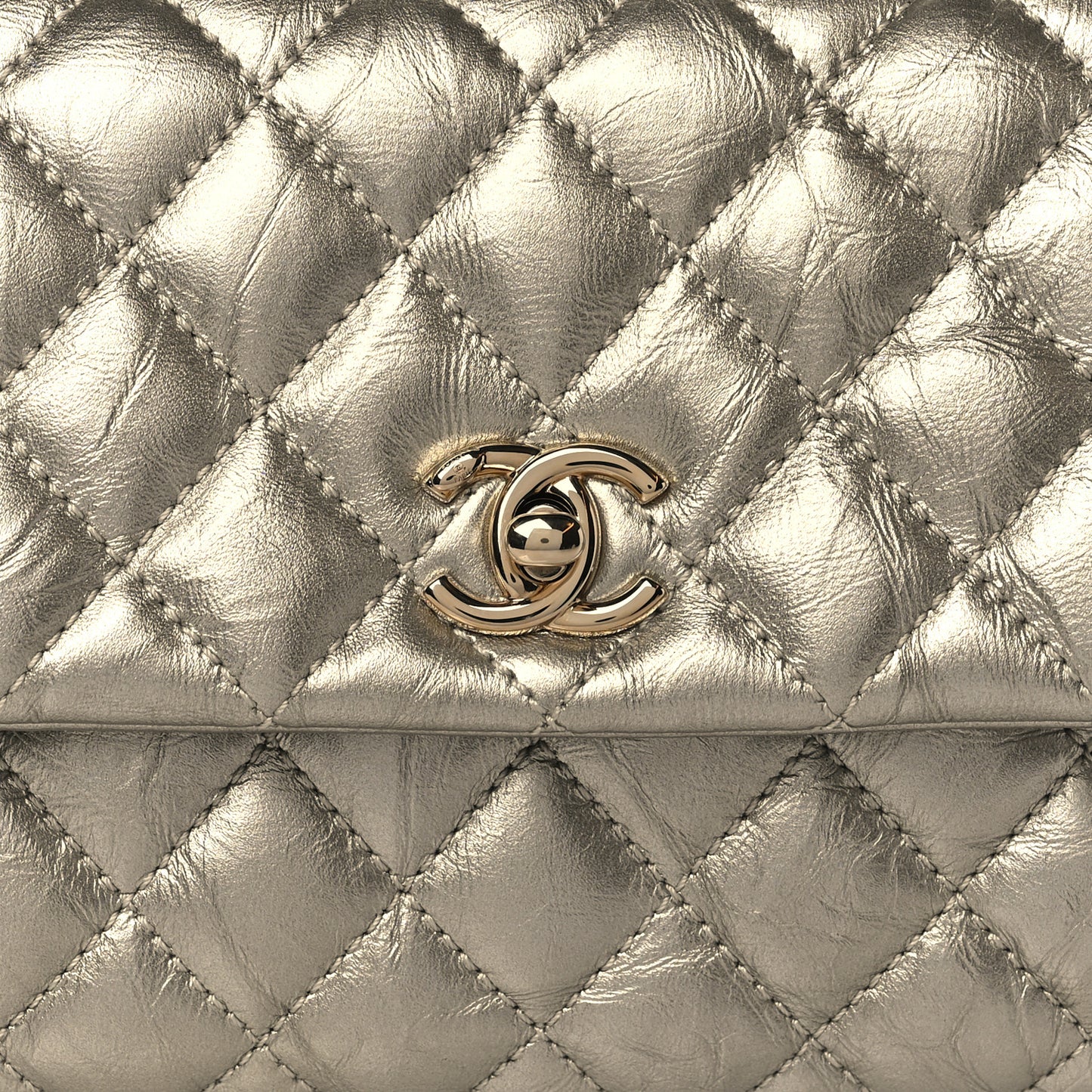 Metallic Aged Calfskin Quilted Mini Coco Handle Flap Gold