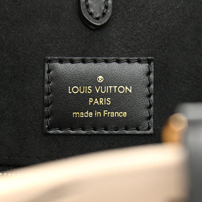 Louis Vuitton Empreinte Monogram Giant Broderies Onthego MM Cream Black 6 of 8